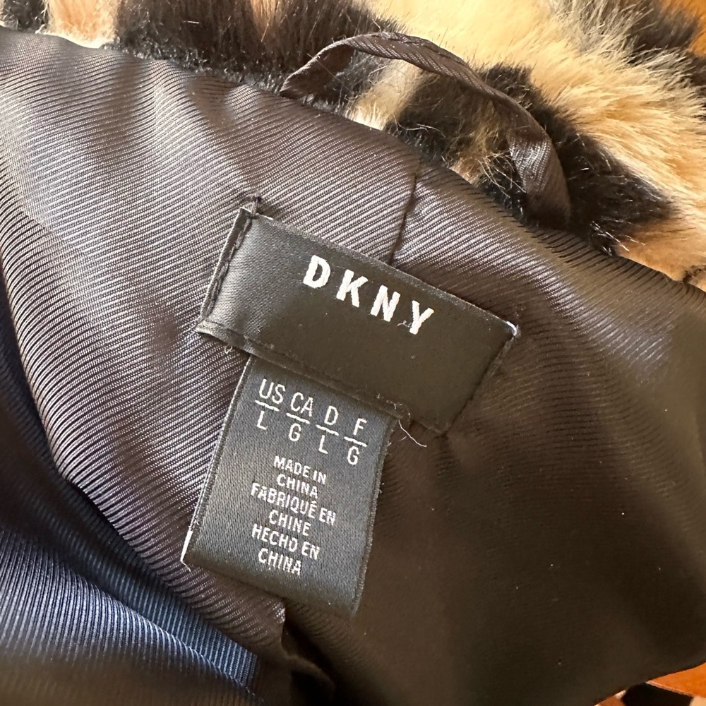 Almost new DKNY faux fur leopard coat.